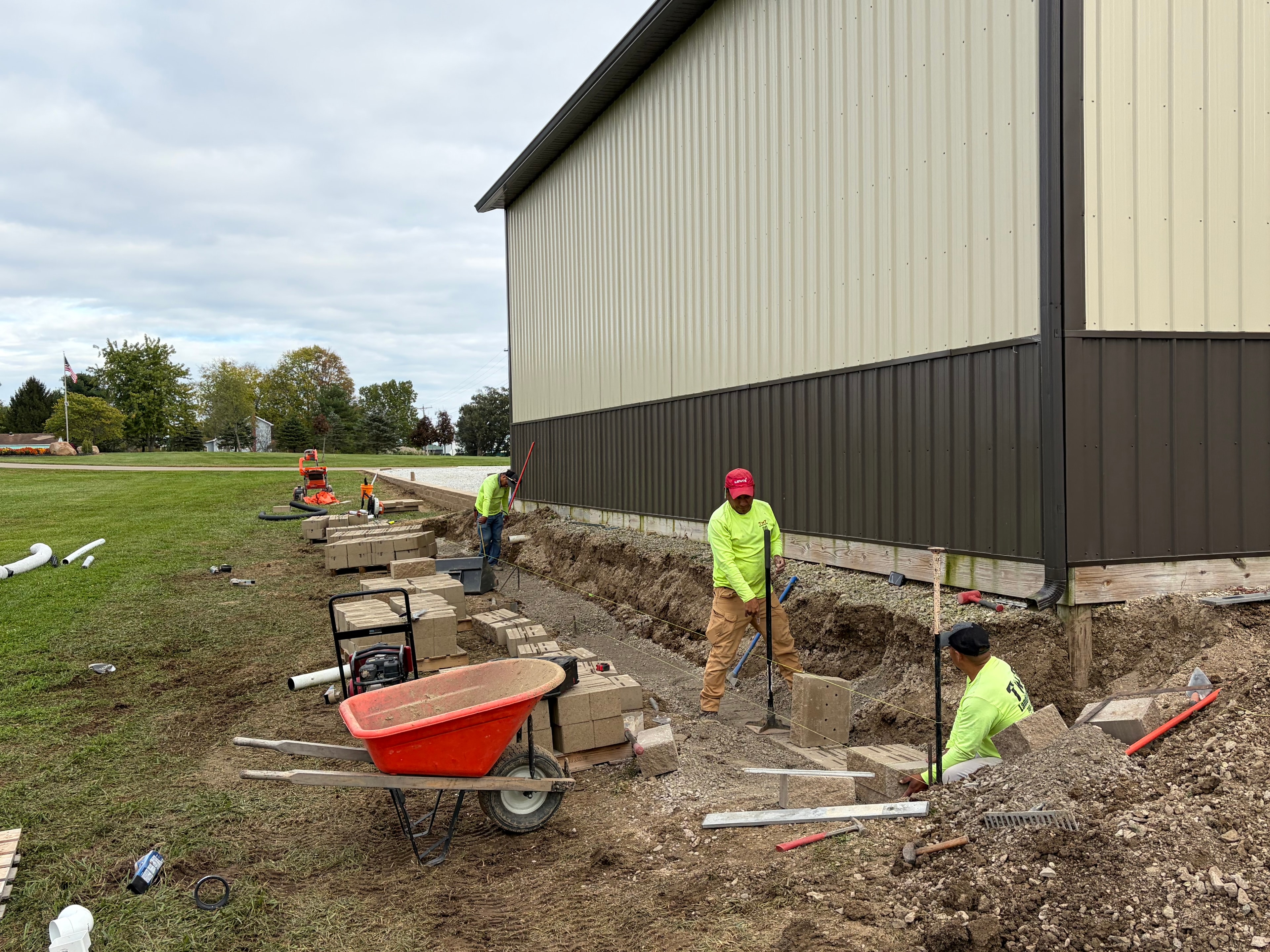 TNT Landscaping truck and crew at a Central Ohio property