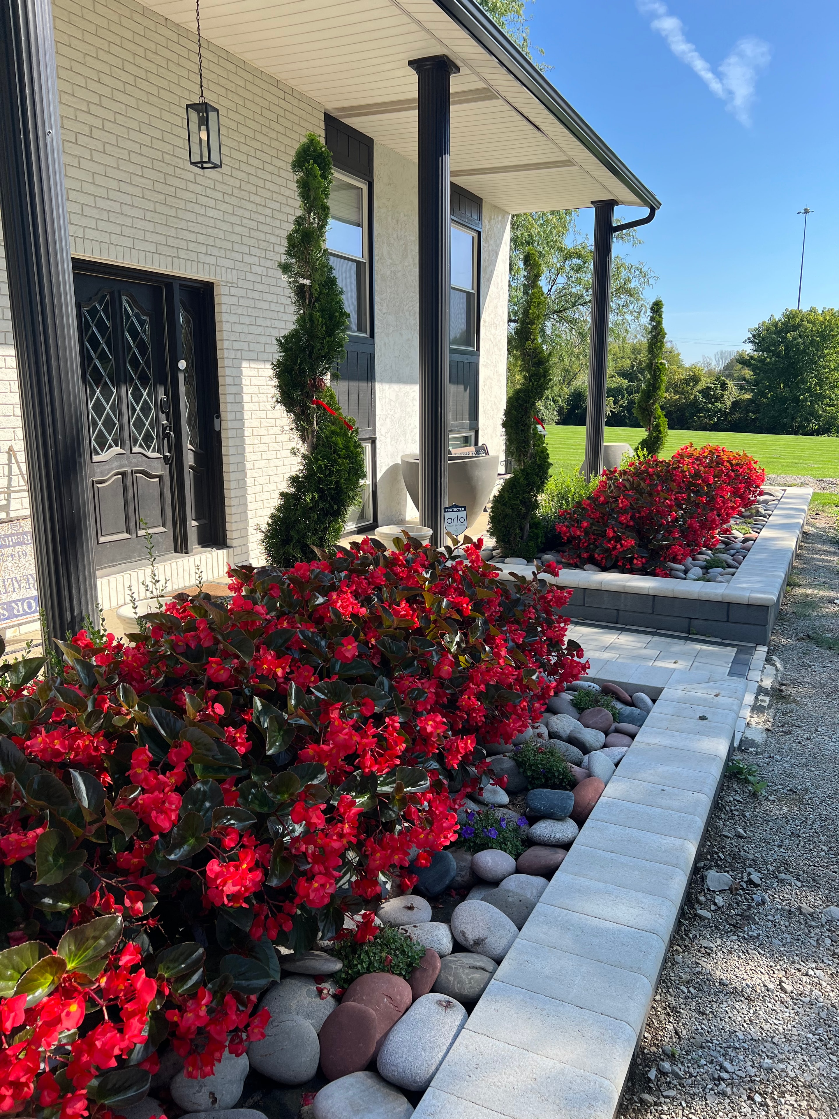 Landscape design and installation with flower beds and plantings